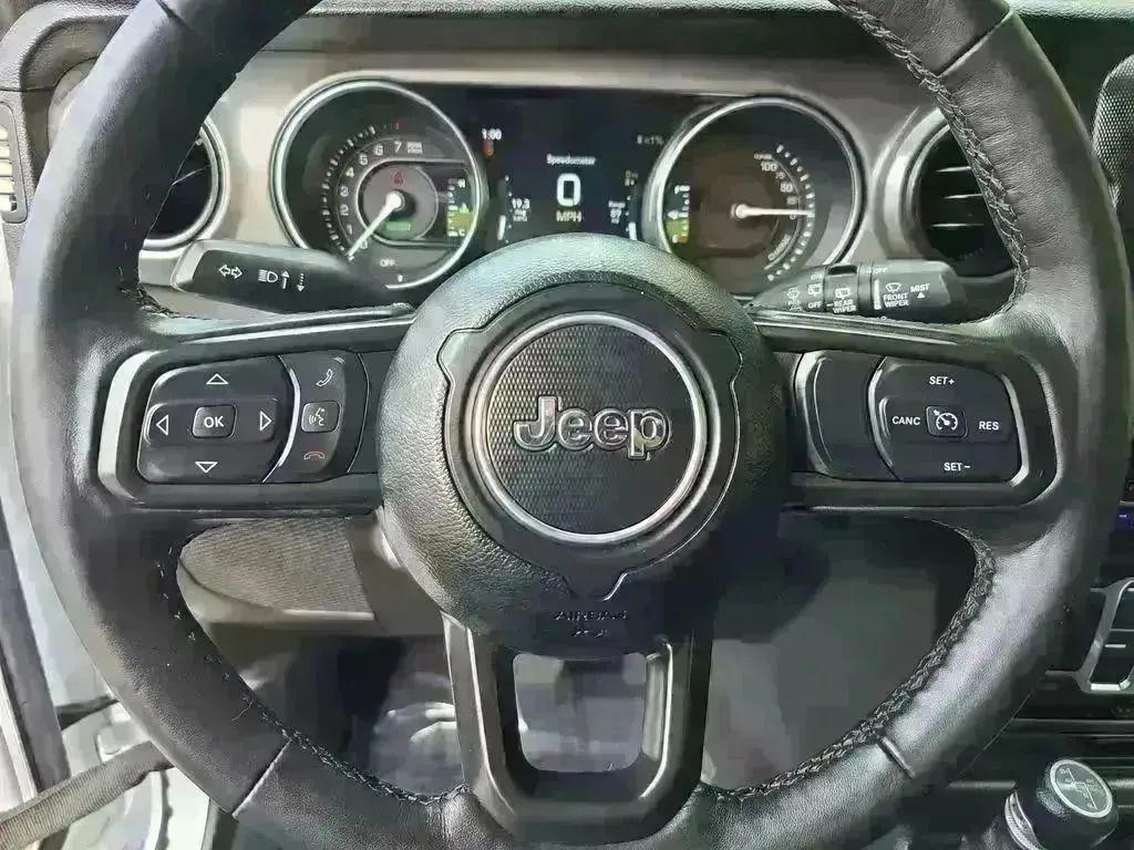 used 2023 Jeep Wrangler 4xe car, priced at $25,797