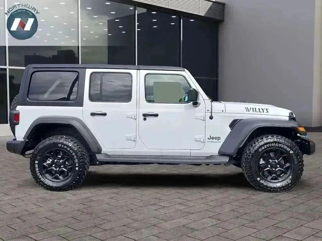 used 2023 Jeep Wrangler 4xe car, priced at $27,797