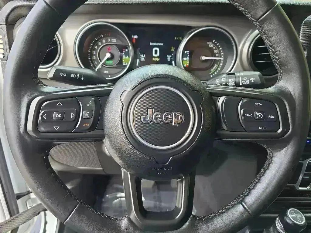 used 2023 Jeep Wrangler 4xe car, priced at $27,797