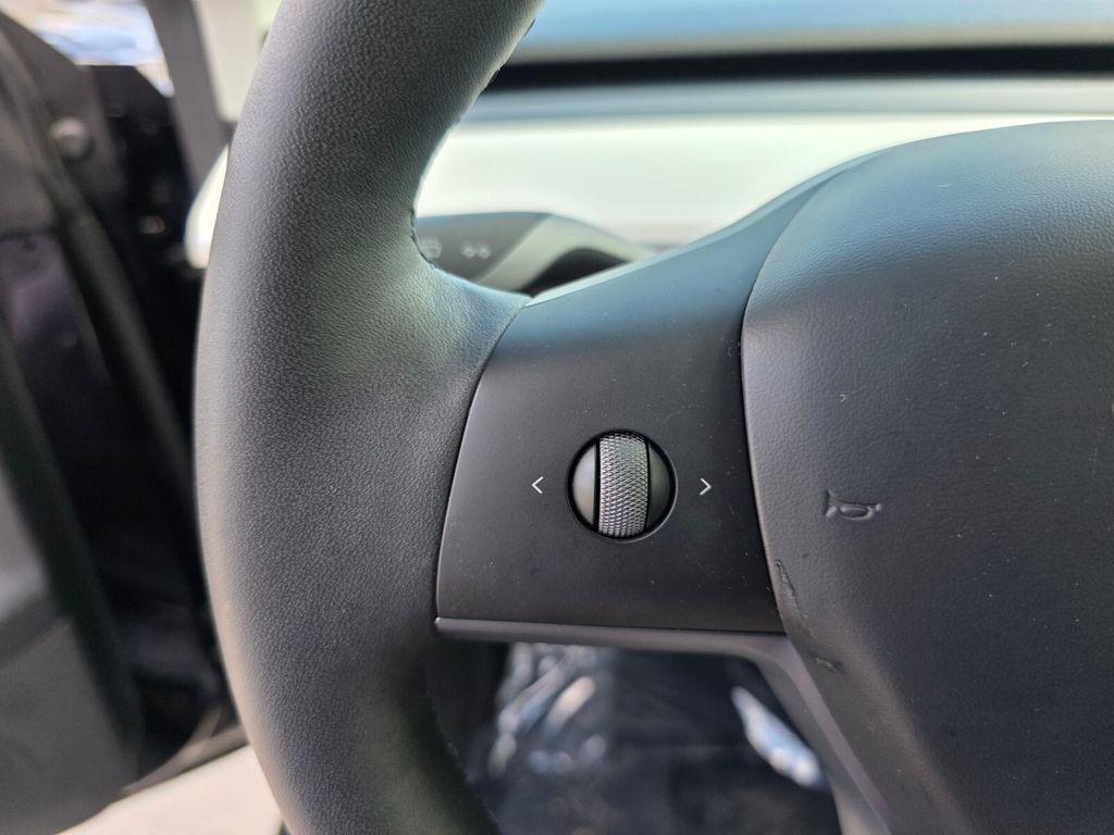 used 2025 Tesla Model Y car, priced at $38,200