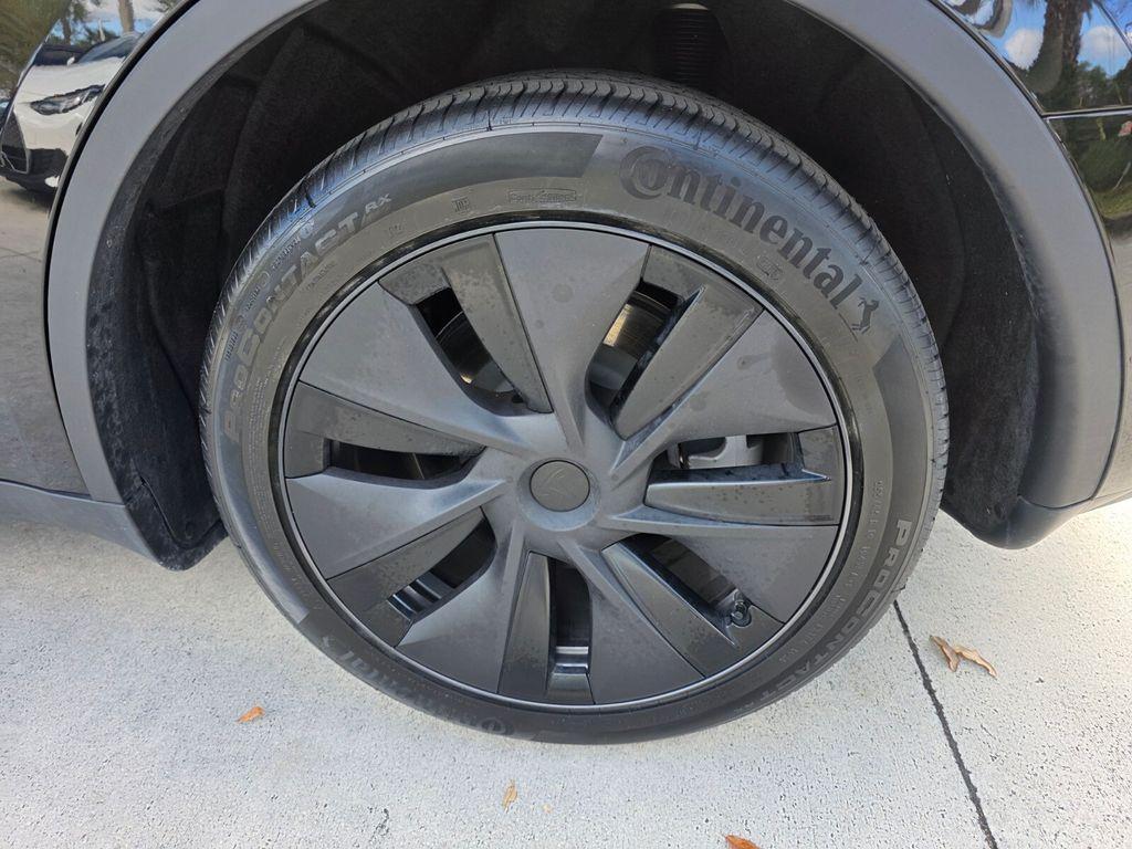 used 2025 Tesla Model Y car, priced at $38,200