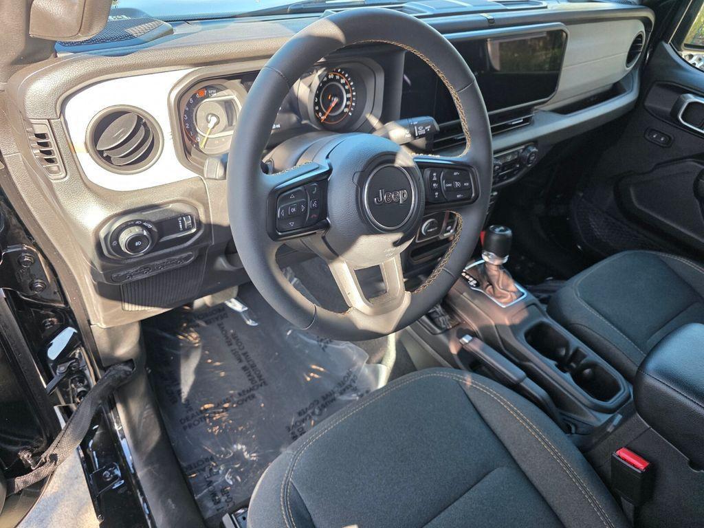 used 2024 Jeep Wrangler car, priced at $33,200