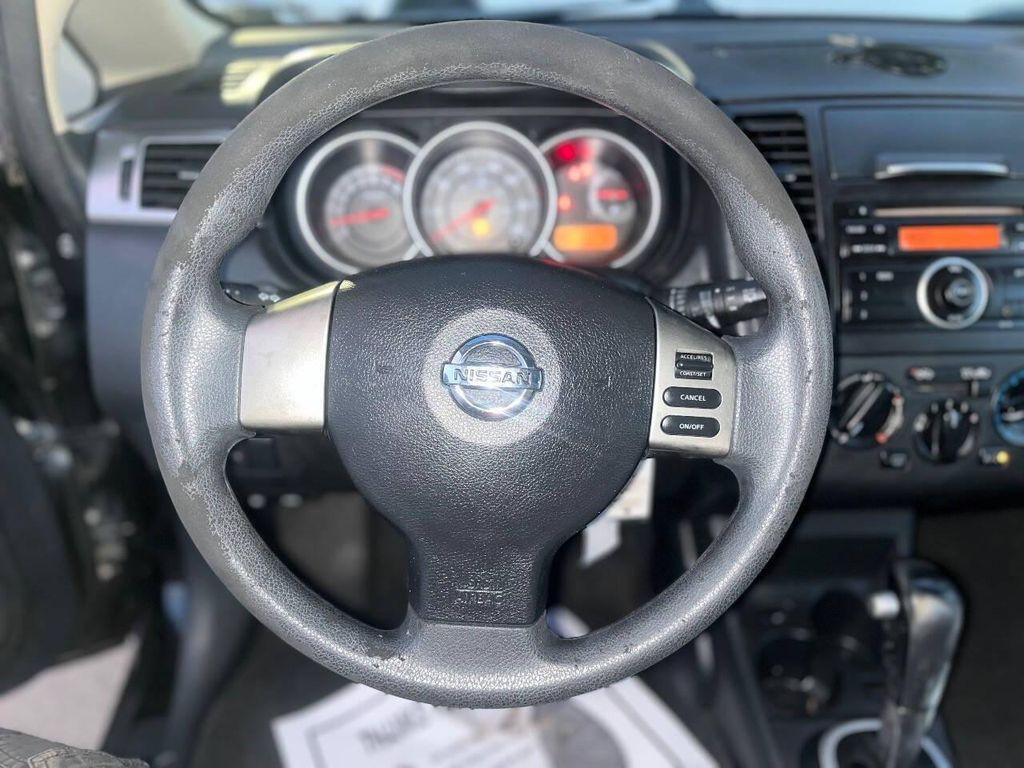 used 2011 Nissan Versa car, priced at $5,500