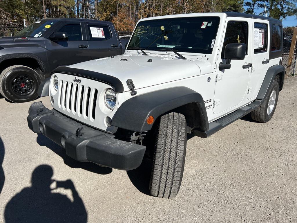 used 2014 Jeep Wrangler Unlimited car, priced at $16,950