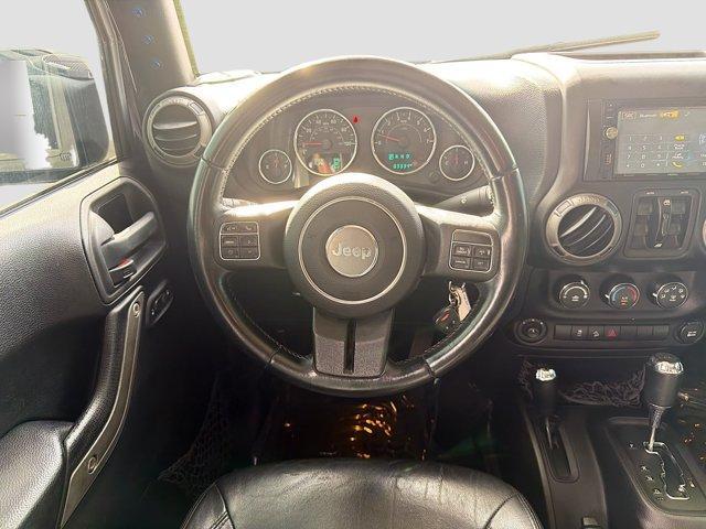 used 2015 Jeep Wrangler Unlimited car, priced at $16,990