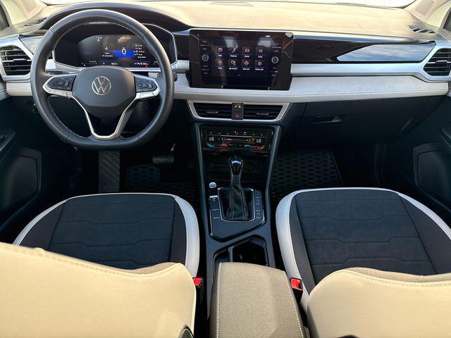 used 2025 Volkswagen Taos car, priced at $22,916