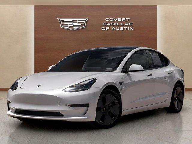 used 2023 Tesla Model 3 car, priced at $28,625
