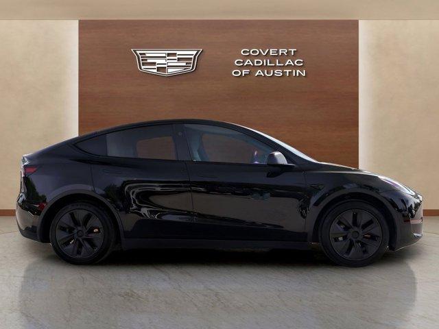 used 2025 Tesla Model Y car, priced at $33,525