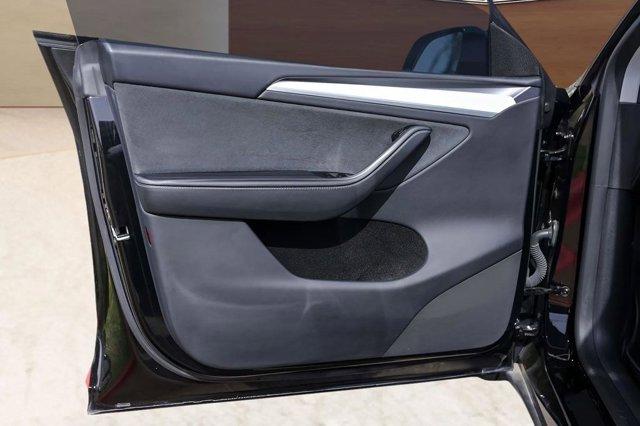 used 2025 Tesla Model Y car, priced at $33,525