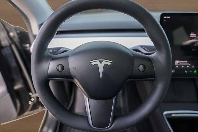 used 2025 Tesla Model Y car, priced at $33,525