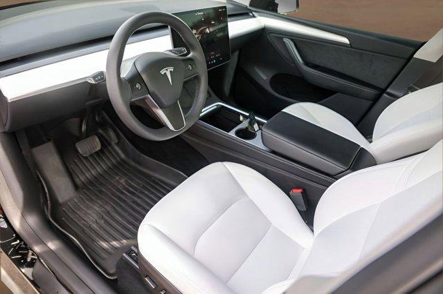 used 2025 Tesla Model Y car, priced at $33,525