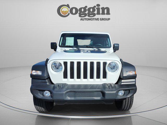 used 2023 Jeep Wrangler car, priced at $25,548