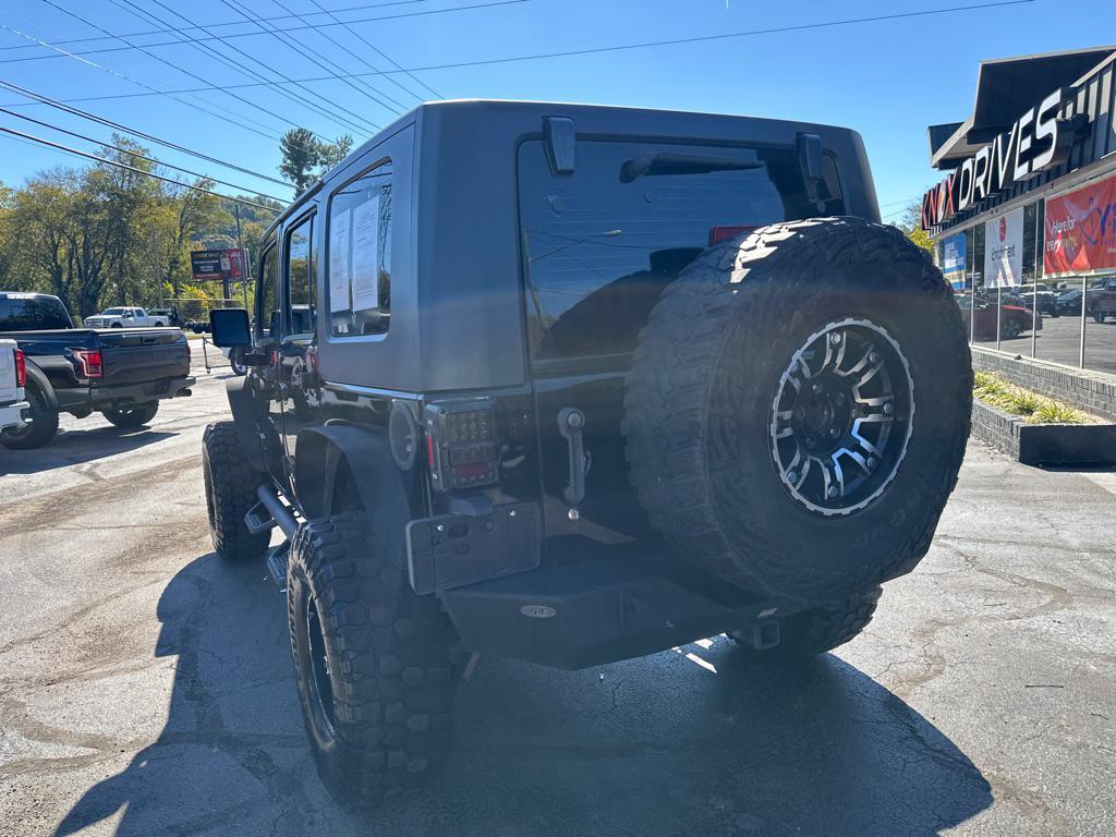used 2010 Jeep Wrangler Unlimited car, priced at $10,500