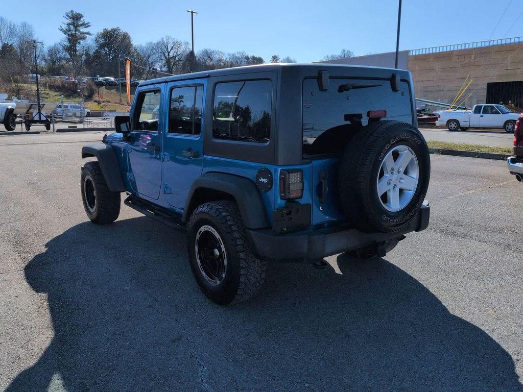 used 2016 Jeep Wrangler Unlimited car, priced at $9,699