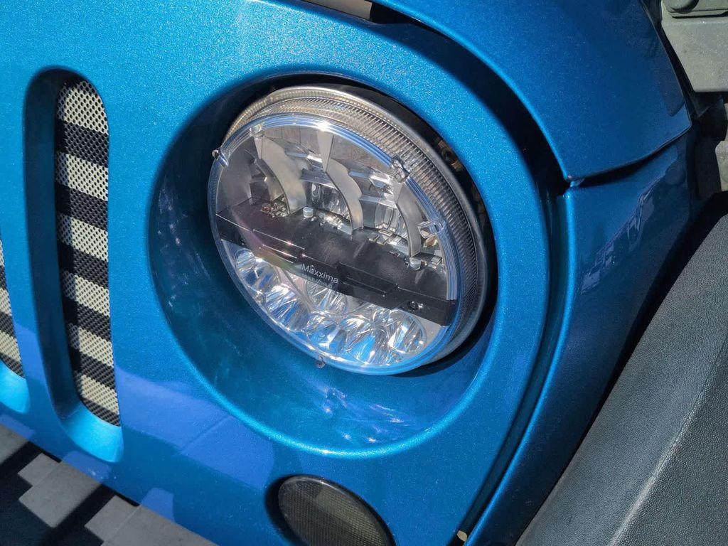 used 2016 Jeep Wrangler Unlimited car, priced at $9,699