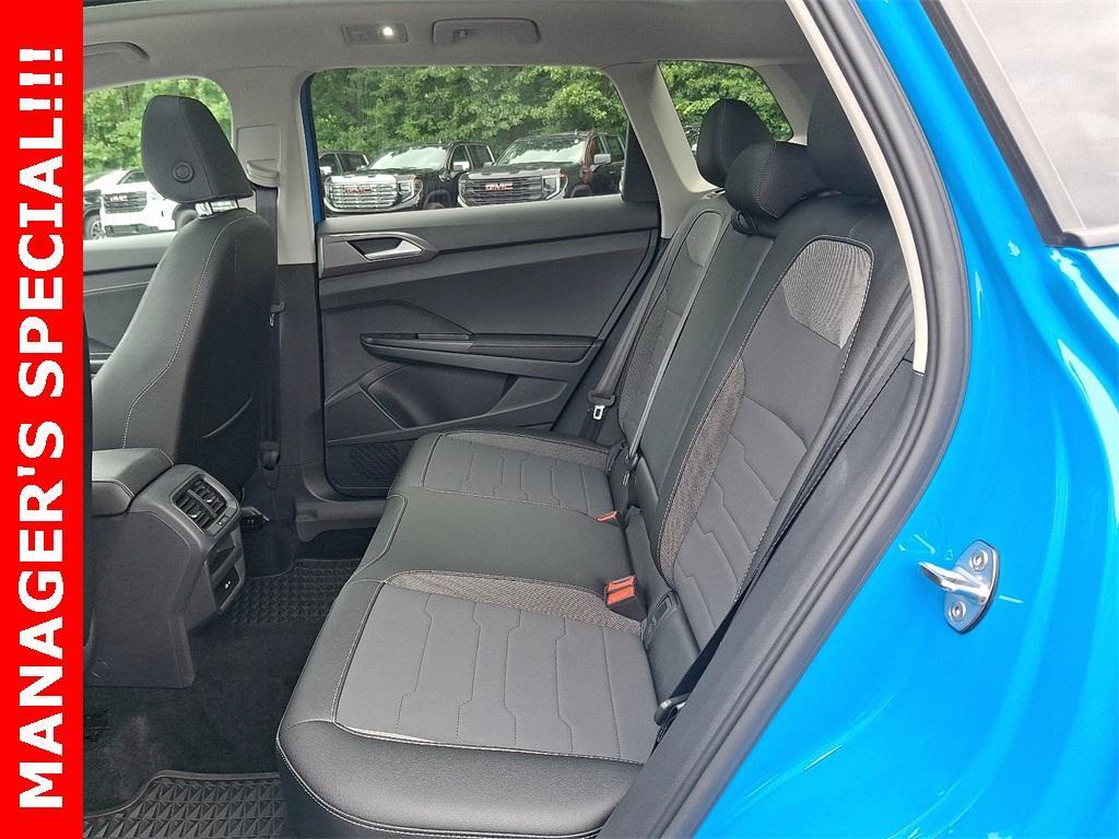 used 2025 Volkswagen Taos car, priced at $27,272