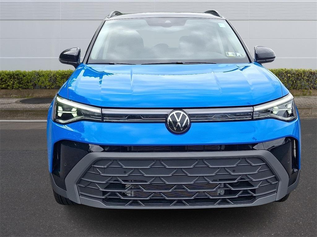 used 2025 Volkswagen Taos car, priced at $27,272