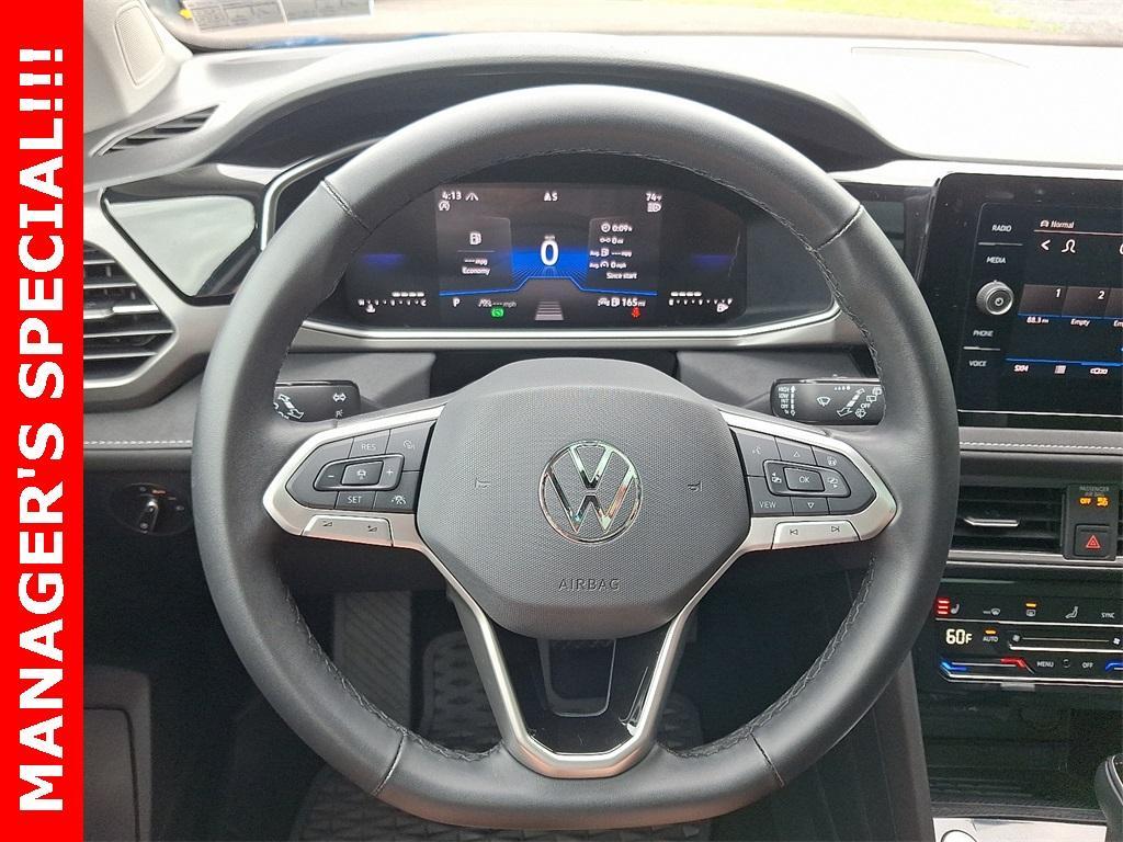 used 2025 Volkswagen Taos car, priced at $27,272