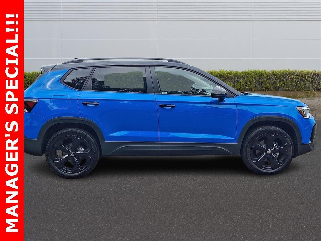used 2025 Volkswagen Taos car, priced at $27,272