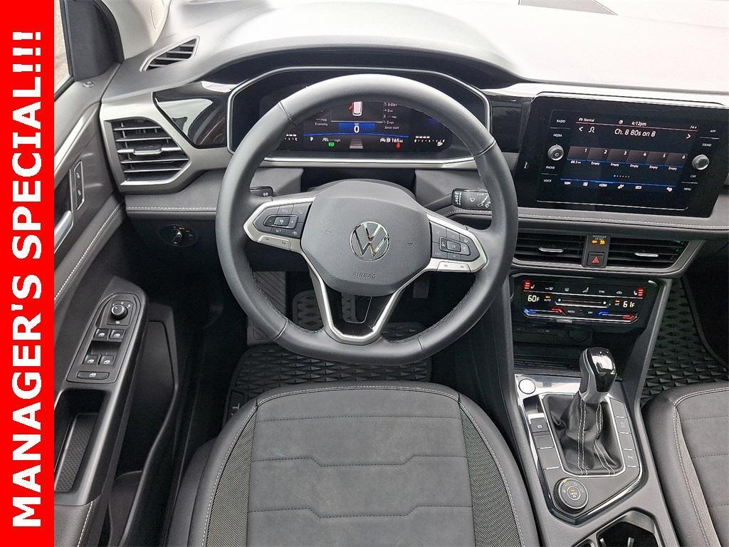 used 2025 Volkswagen Taos car, priced at $27,272