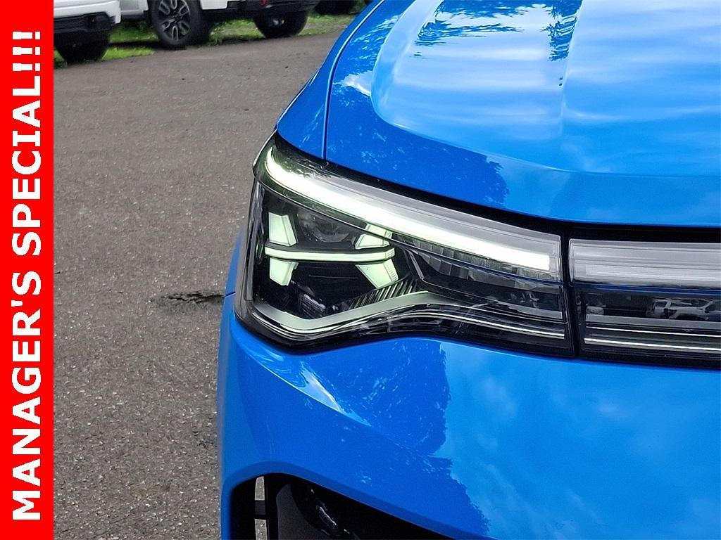 used 2025 Volkswagen Taos car, priced at $27,272