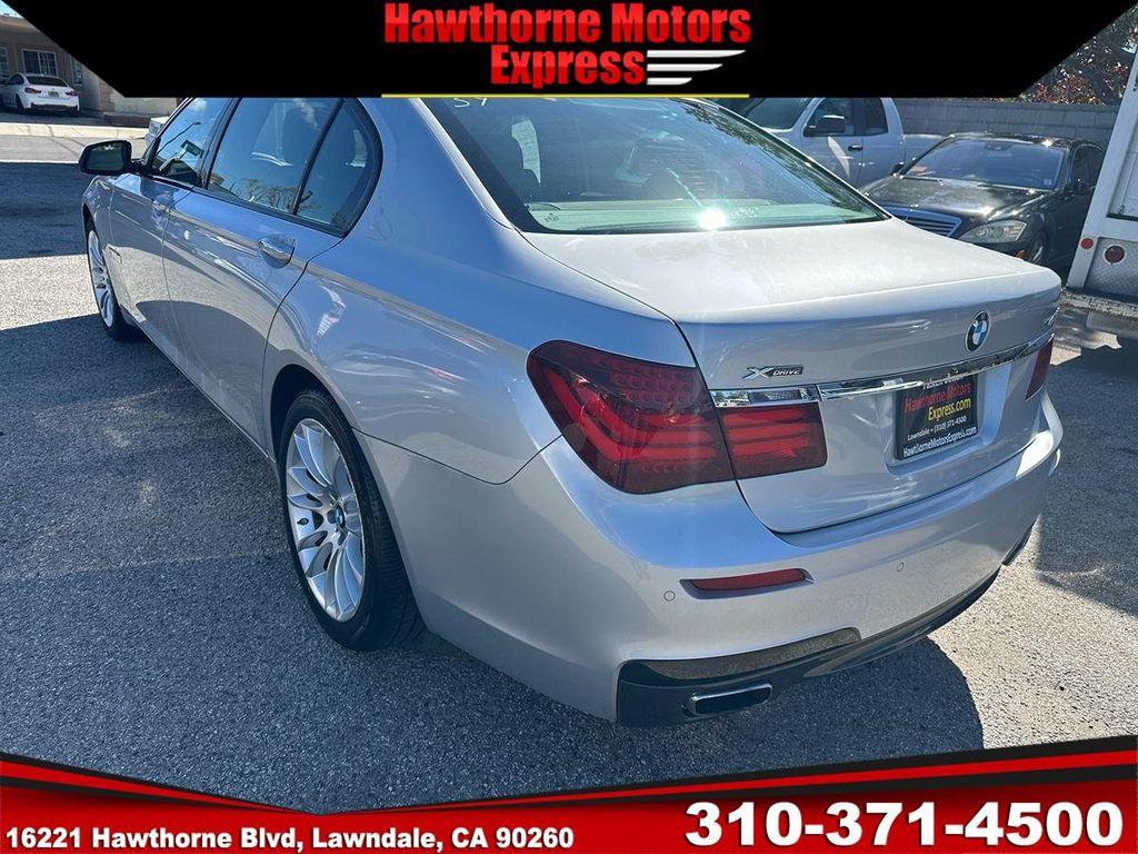 used 2014 BMW 740 car, priced at $15,900