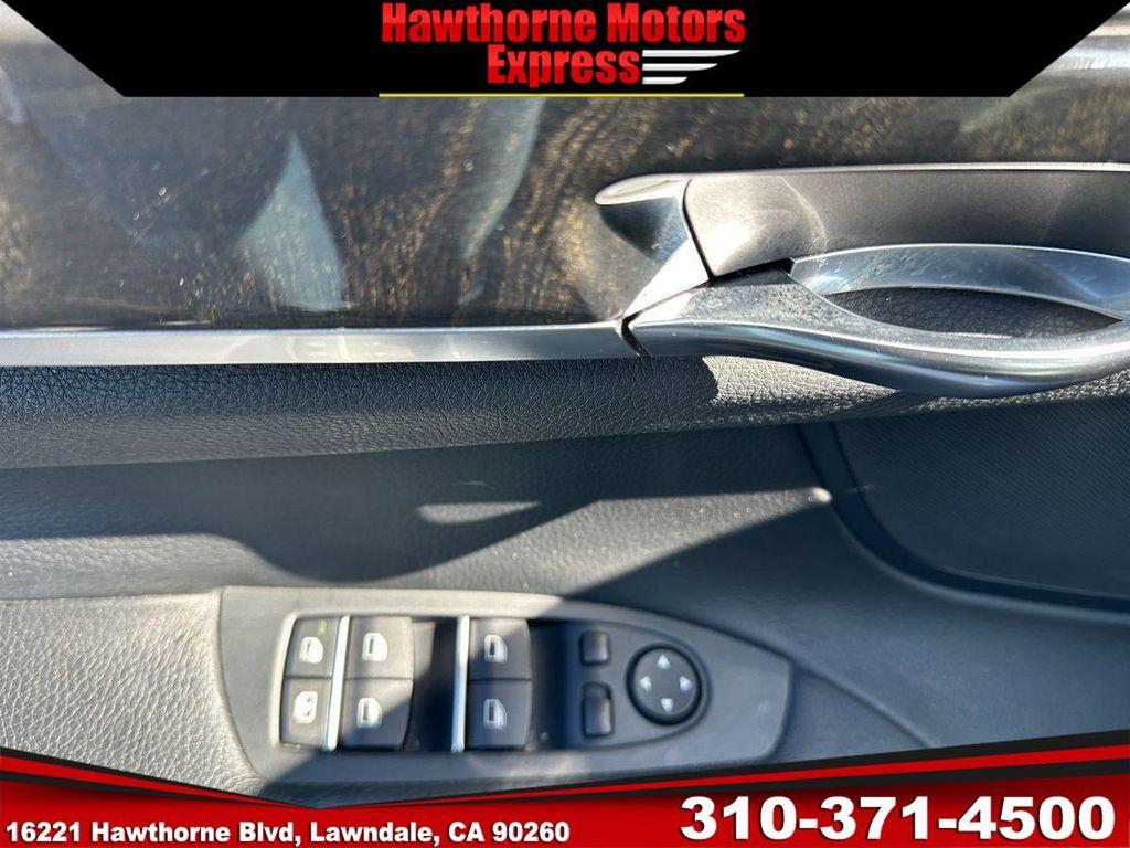 used 2014 BMW 740 car, priced at $15,900