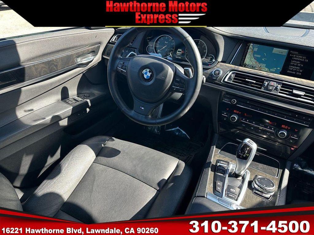 used 2014 BMW 740 car, priced at $15,900