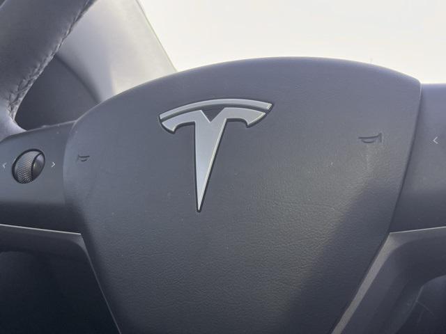 used 2024 Tesla Model Y car, priced at $39,995