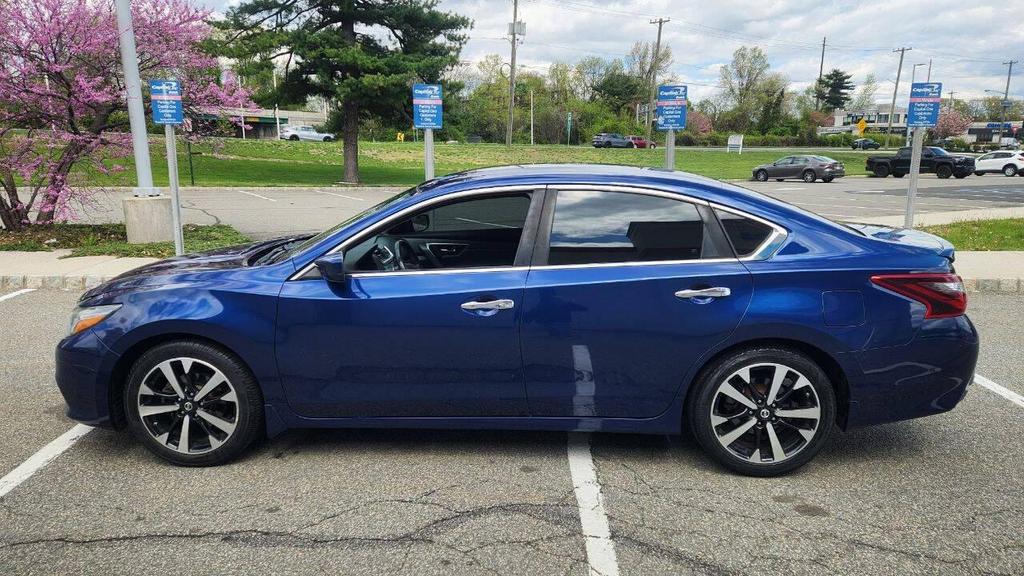used 2018 Nissan Altima car, priced at $7,995