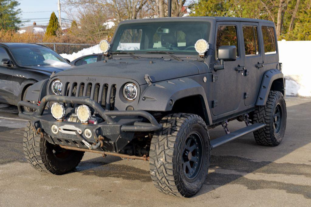 used 2016 Jeep Wrangler Unlimited car, priced at $13,393