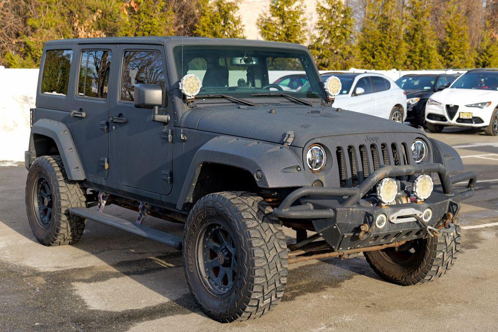 used 2016 Jeep Wrangler Unlimited car, priced at $13,393