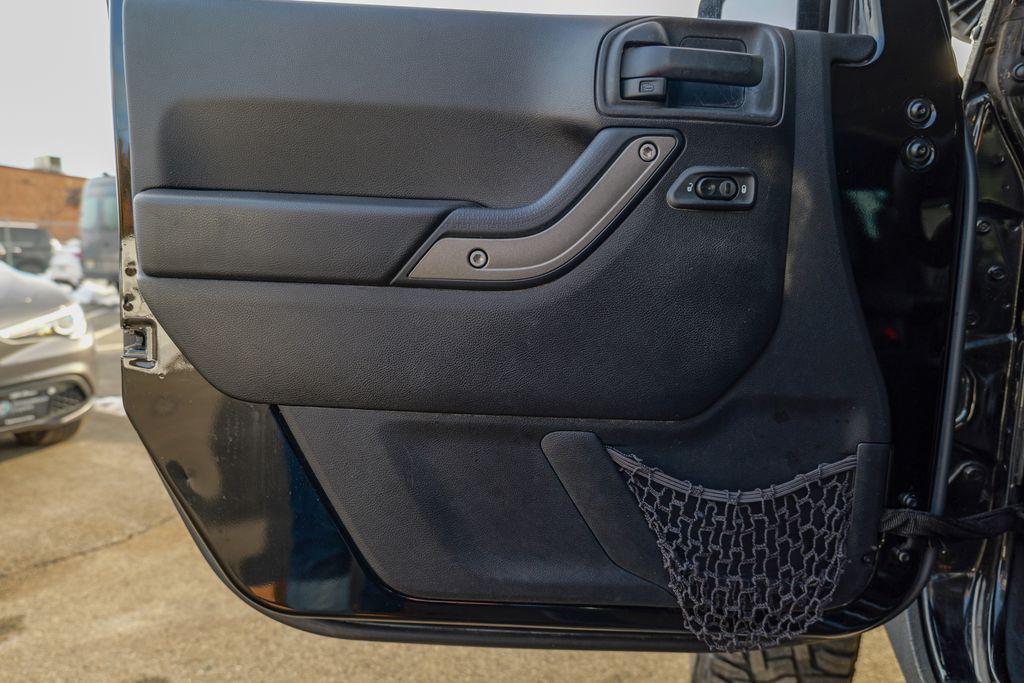 used 2016 Jeep Wrangler Unlimited car, priced at $13,393