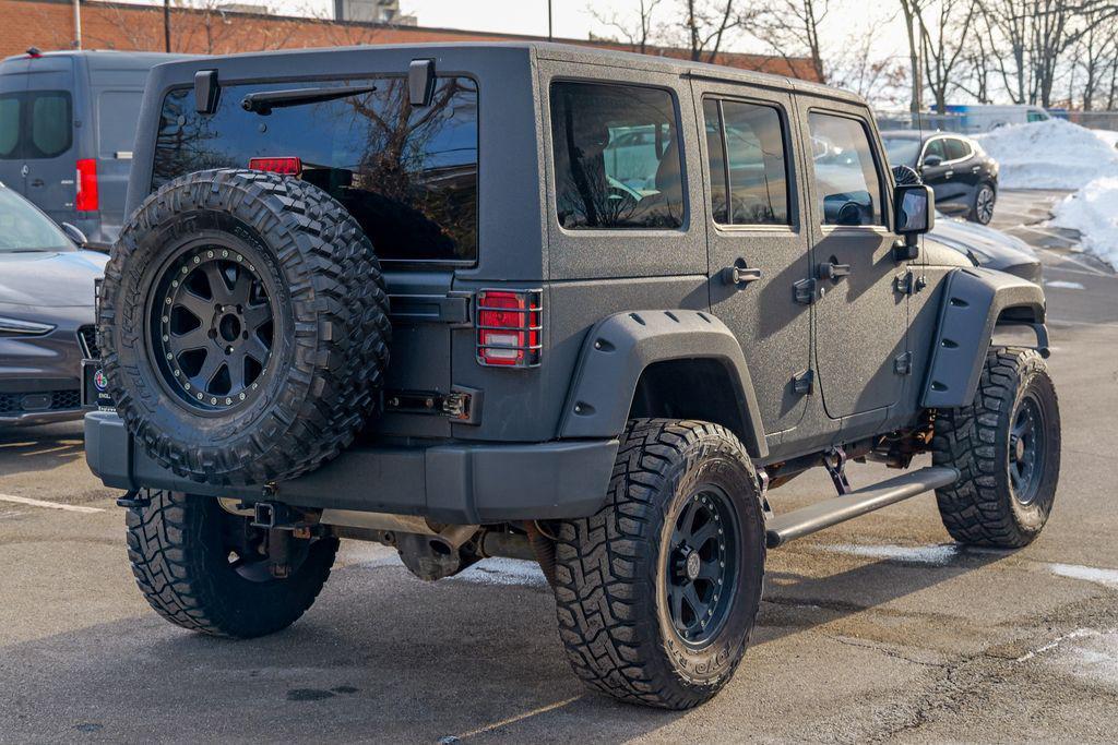 used 2016 Jeep Wrangler Unlimited car, priced at $13,393