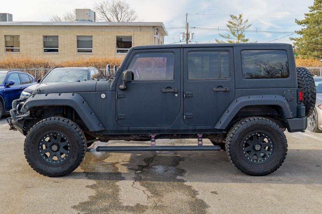 used 2016 Jeep Wrangler Unlimited car, priced at $13,393