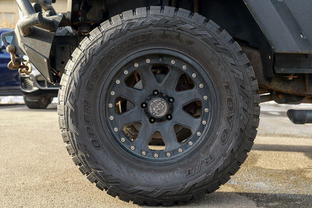 used 2016 Jeep Wrangler Unlimited car, priced at $13,393