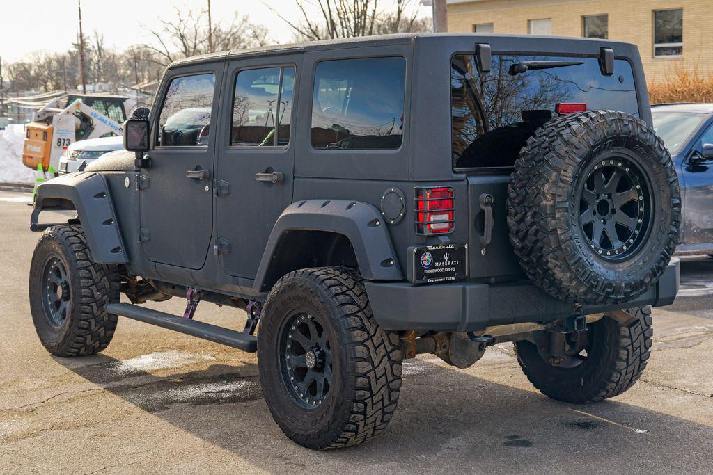 used 2016 Jeep Wrangler Unlimited car, priced at $13,393