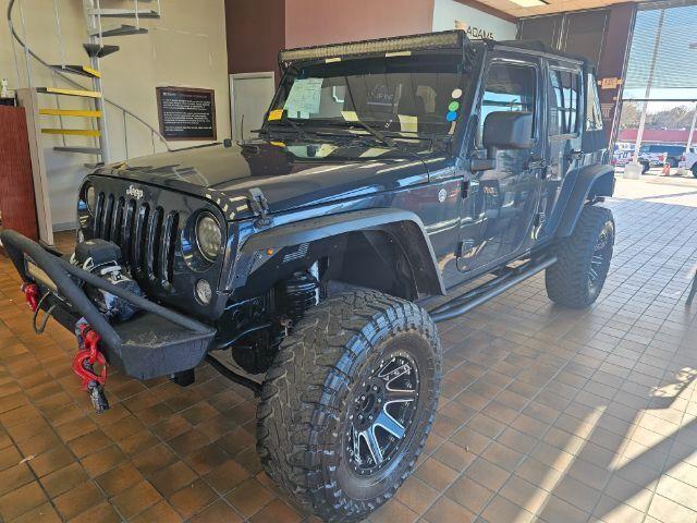 used 2016 Jeep Wrangler Unlimited car, priced at $16,500