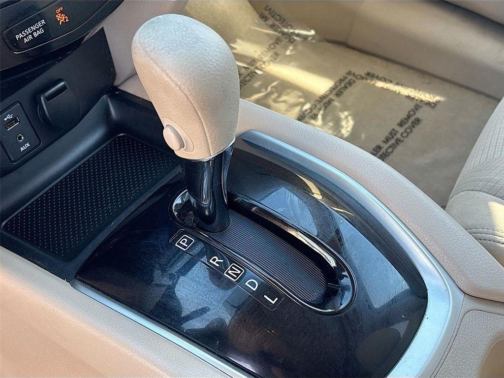 used 2015 Nissan Rogue car, priced at $9,999