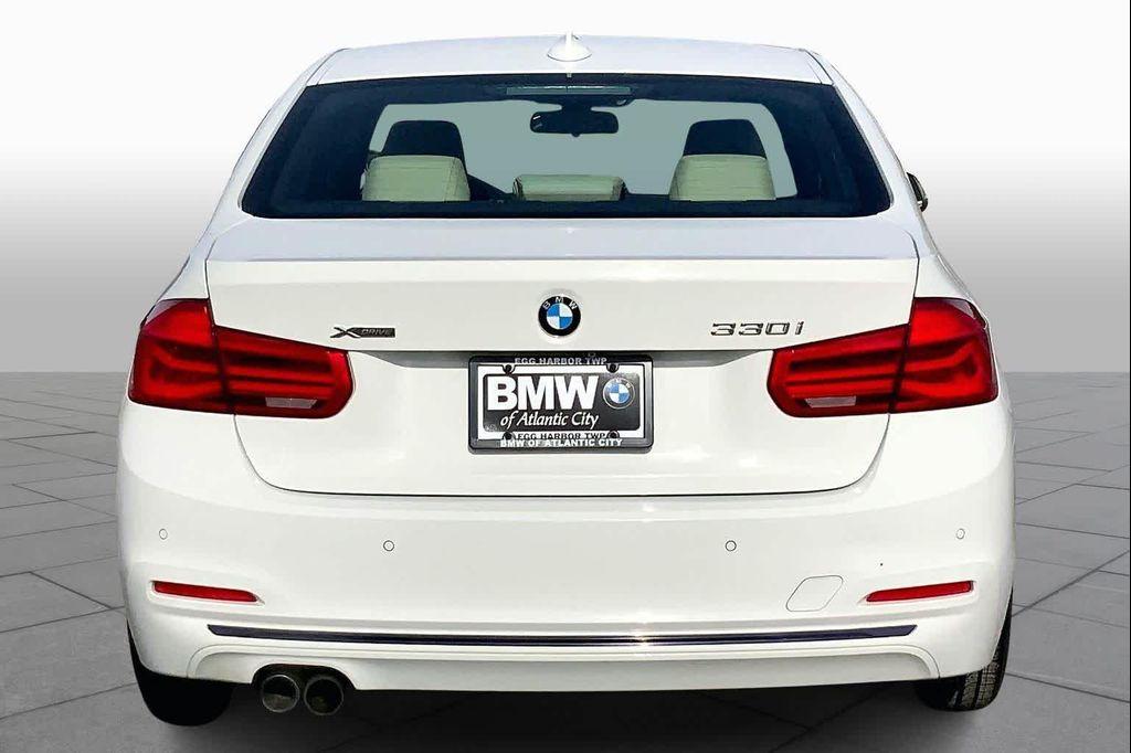 used 2018 BMW 330 car, priced at $15,039