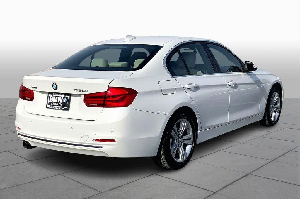 used 2018 BMW 330 car, priced at $15,039