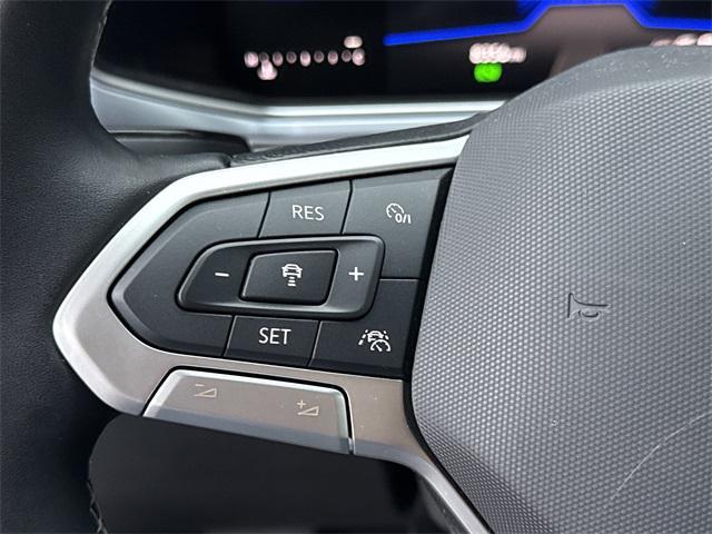 used 2025 Volkswagen Taos car, priced at $26,899