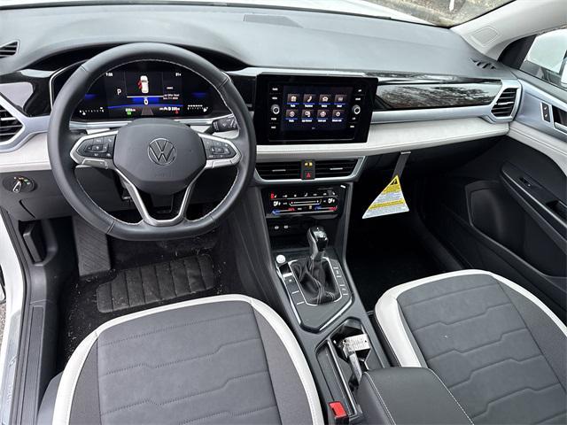 used 2025 Volkswagen Taos car, priced at $26,899