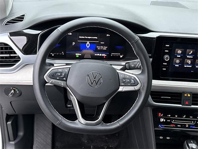 used 2025 Volkswagen Taos car, priced at $26,899