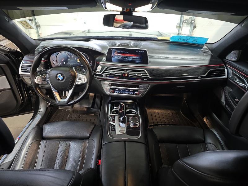 used 2016 BMW 750 car, priced at $21,999