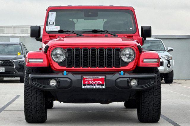 used 2024 Jeep Wrangler 4xe car, priced at $27,498