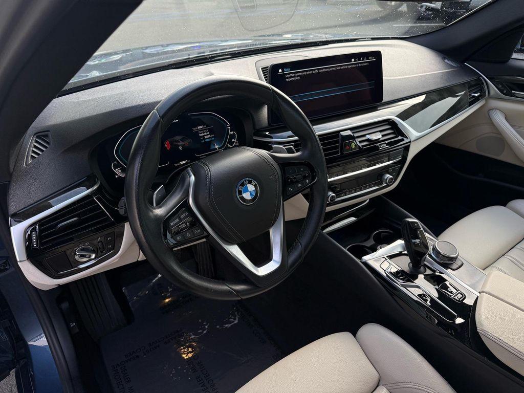 used 2023 BMW 530e car, priced at $33,588