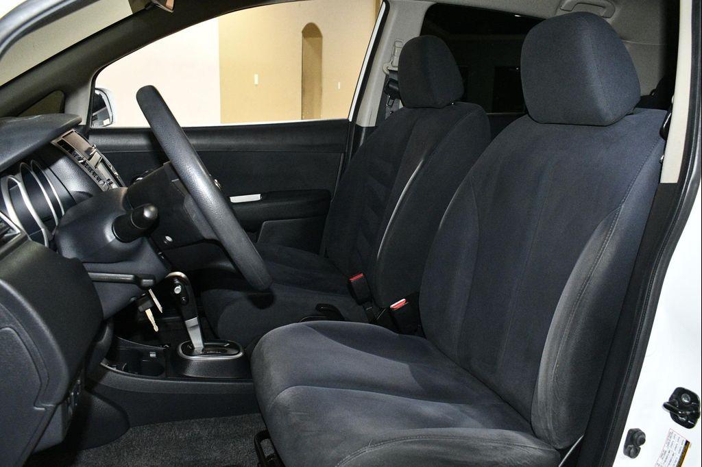 used 2009 Nissan Versa car, priced at $4,999