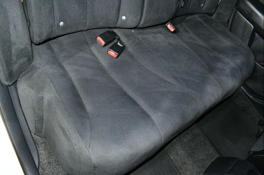 used 2009 Nissan Versa car, priced at $4,999
