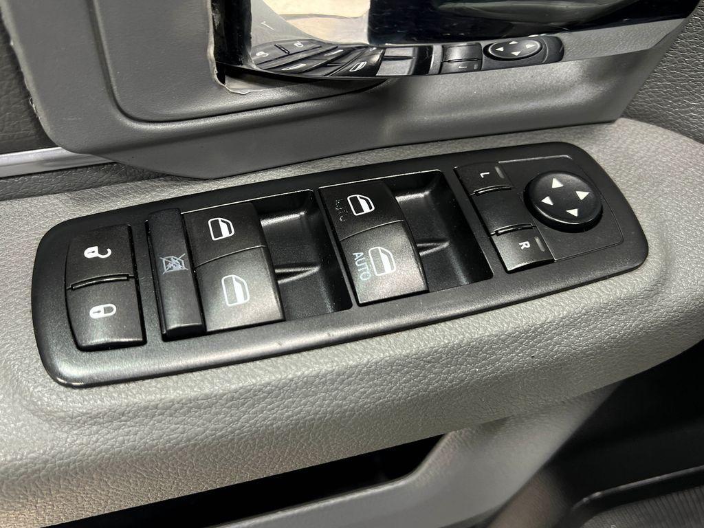 used 2015 Ram 1500 car, priced at $15,650